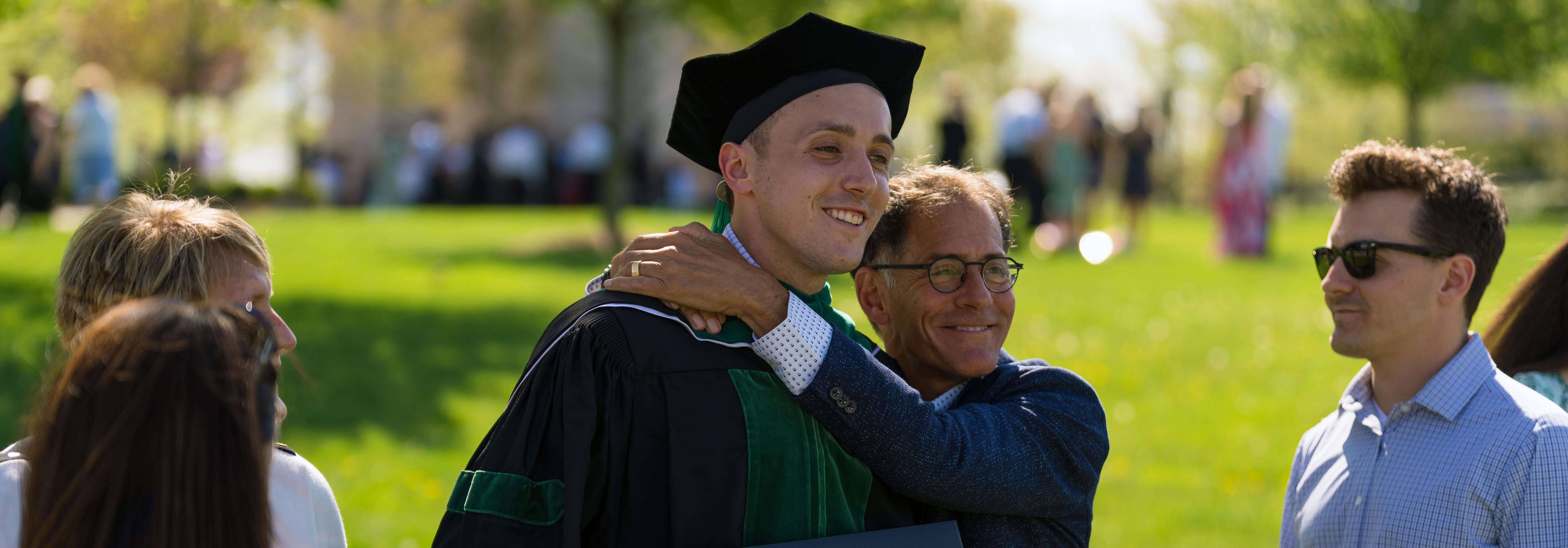 An image of a student and family member