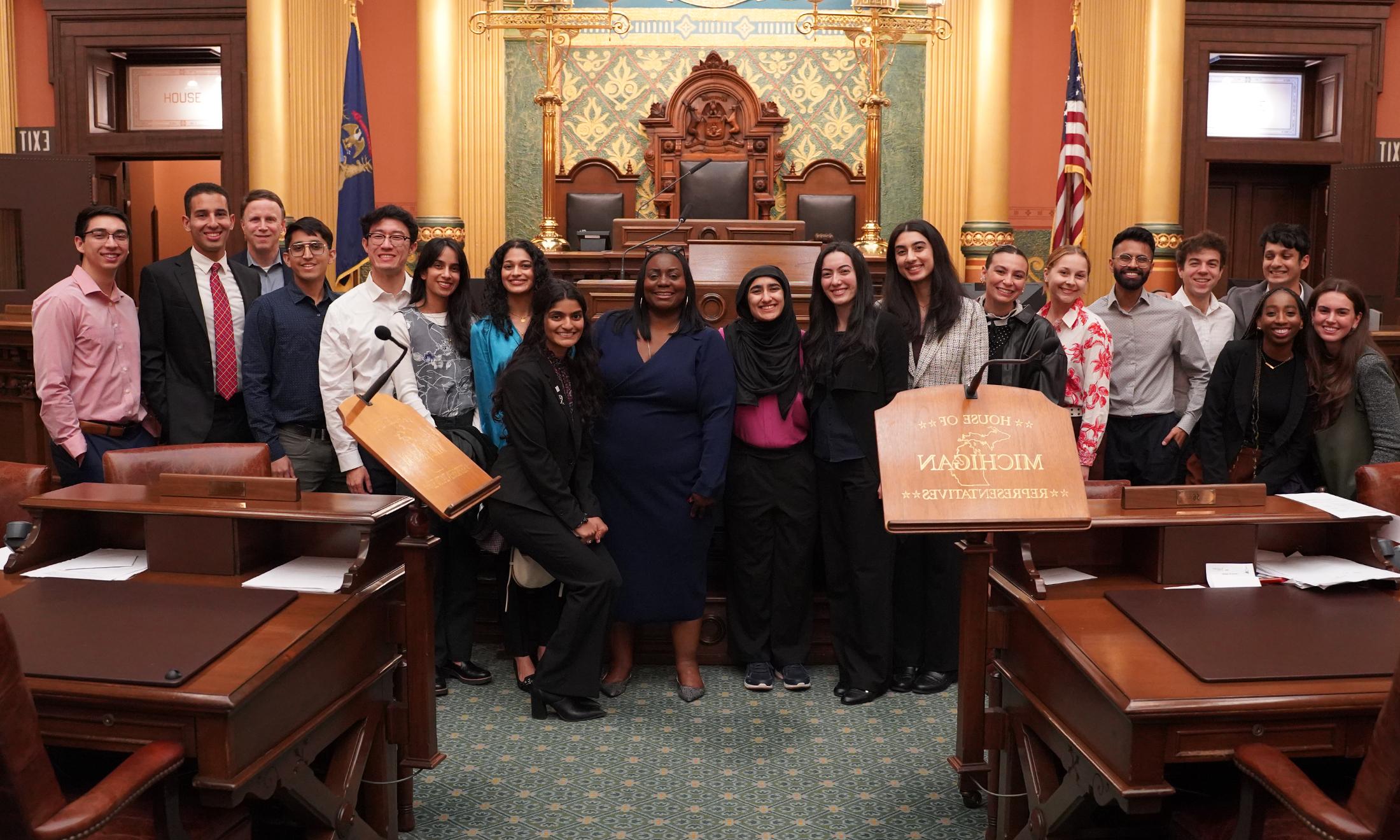 An image of OUWB students in the chambers of the Michigan House of Representatives